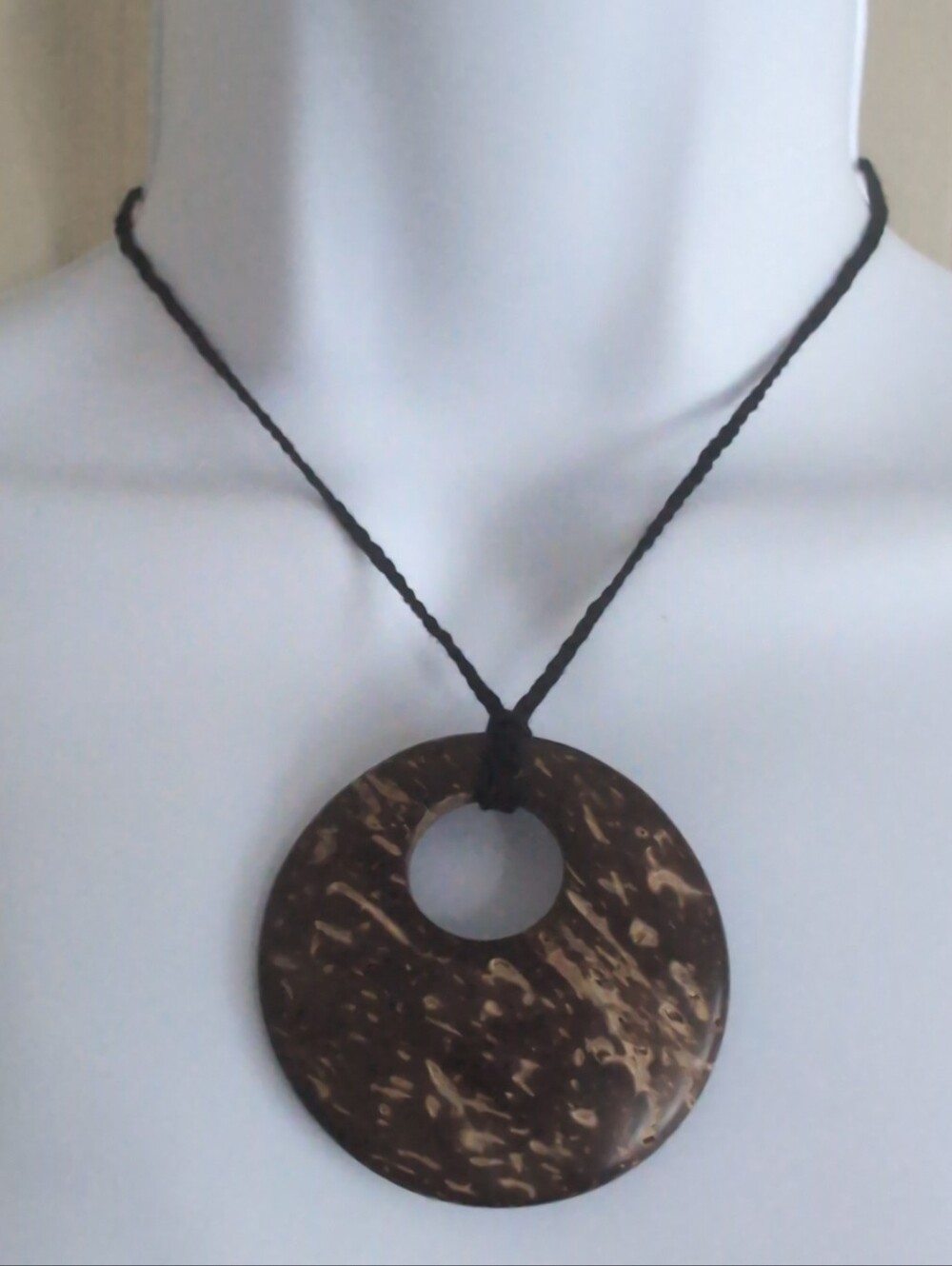 Upcycled brown and tan marbled coconut shell pendant necklace with black braided